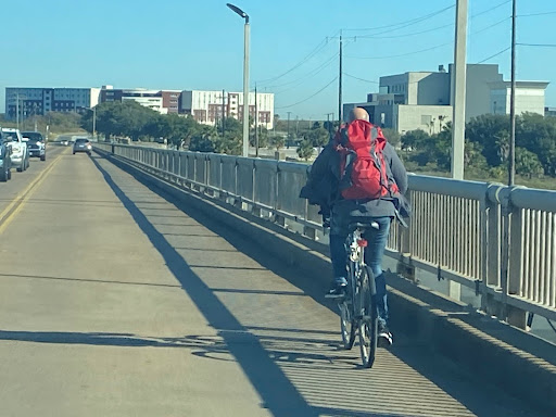 Cyclist on current bridge