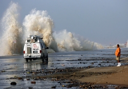 Sea Wall and News Van