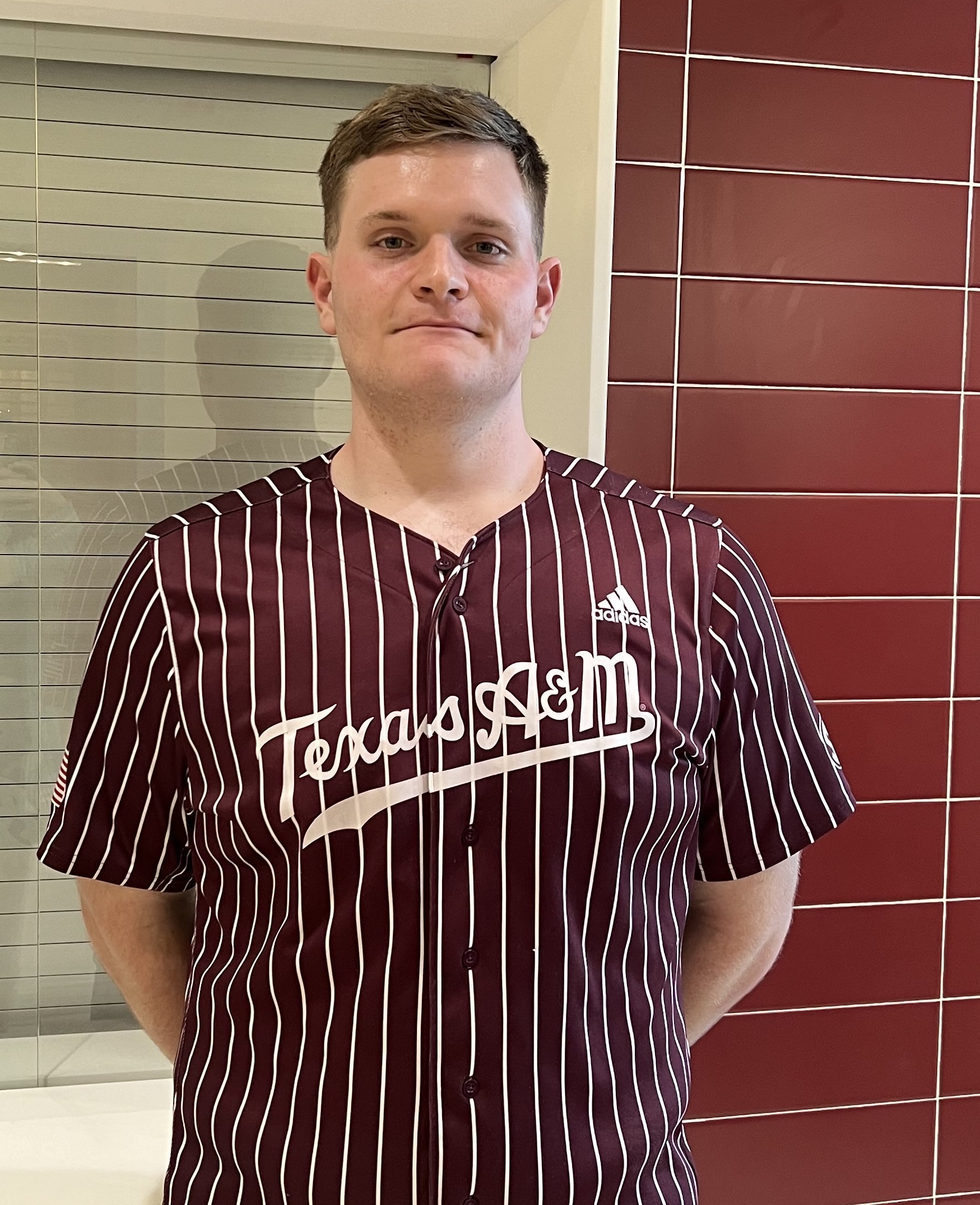 Patrick Cizek poses in the Seibel Student Services Center. Photo by Briana Maltez, '28.