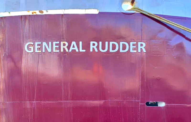 The General Rudder served as the T/S Kings Pointer in an earlier life, as evidenced by the title slightly visible behind the vessel's current name. 
