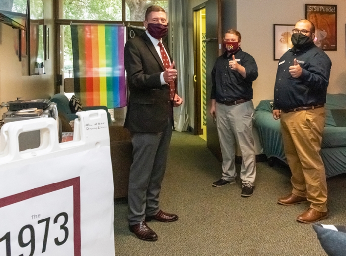 (From left) Col. Mike Fossum, Assistant Director of Student Diversity Initiatives Danny Roe and Diversity Education Specialist Marcos Villareal tour the new 1973 Center inside Hullabaloo Hall. 