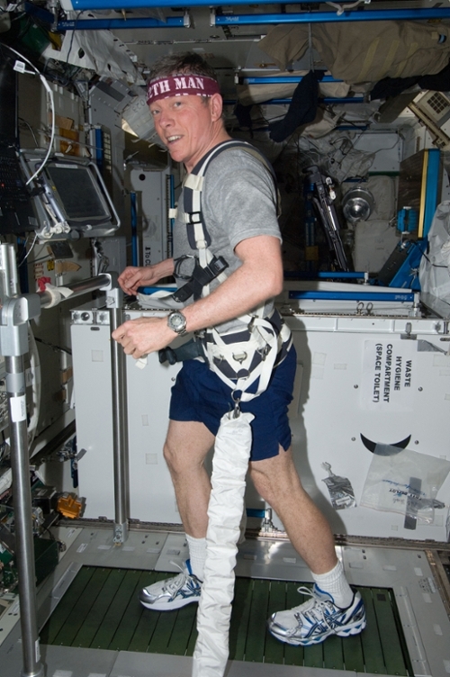 Fossum on a treadmill aboard the ISS