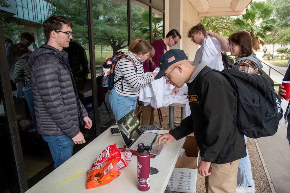 Students collecting data on interest in an on-campus vote center