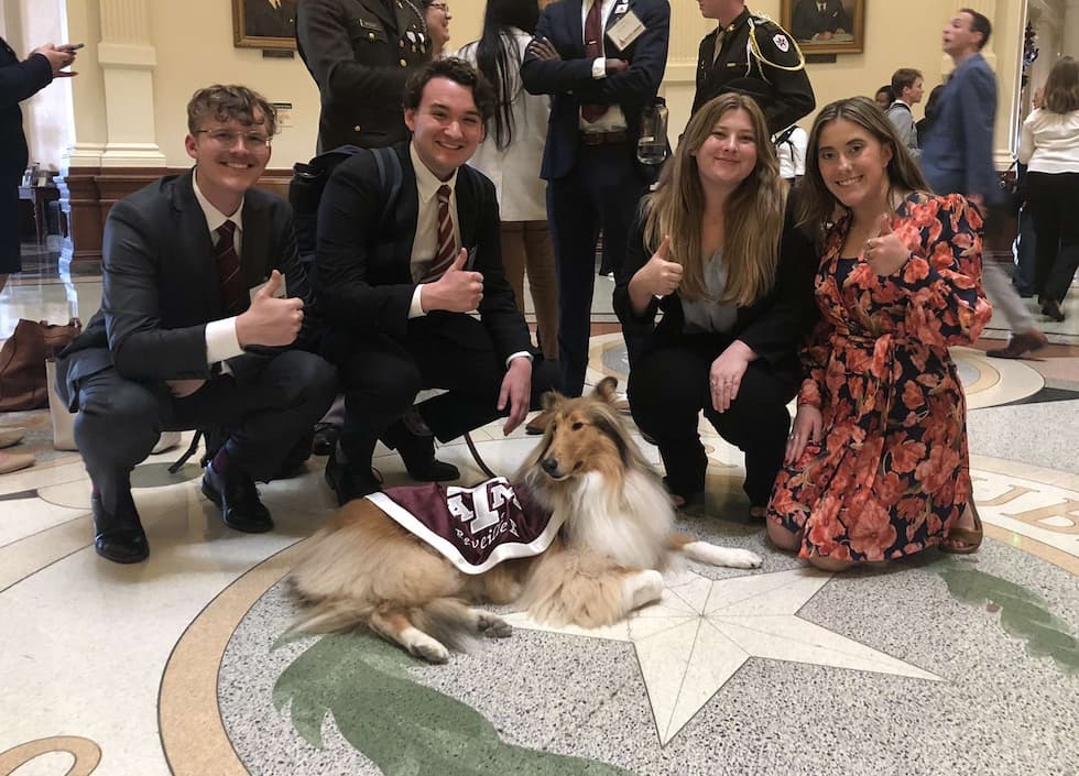 Galveston students with Reveille in the rotunda at the Texas Capitol